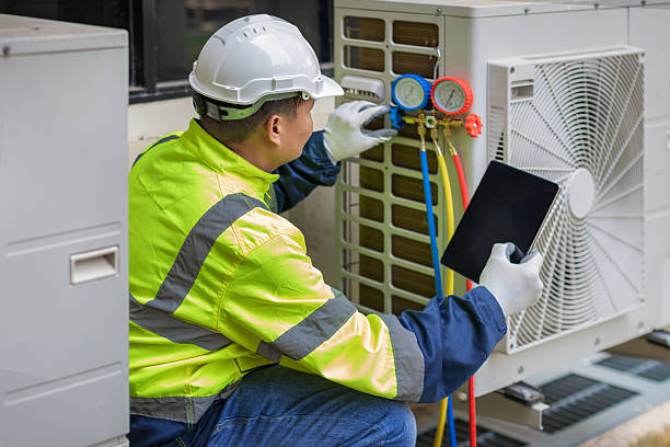 Professional Heat Pump Repair technician working in Gulf Breeze, FL